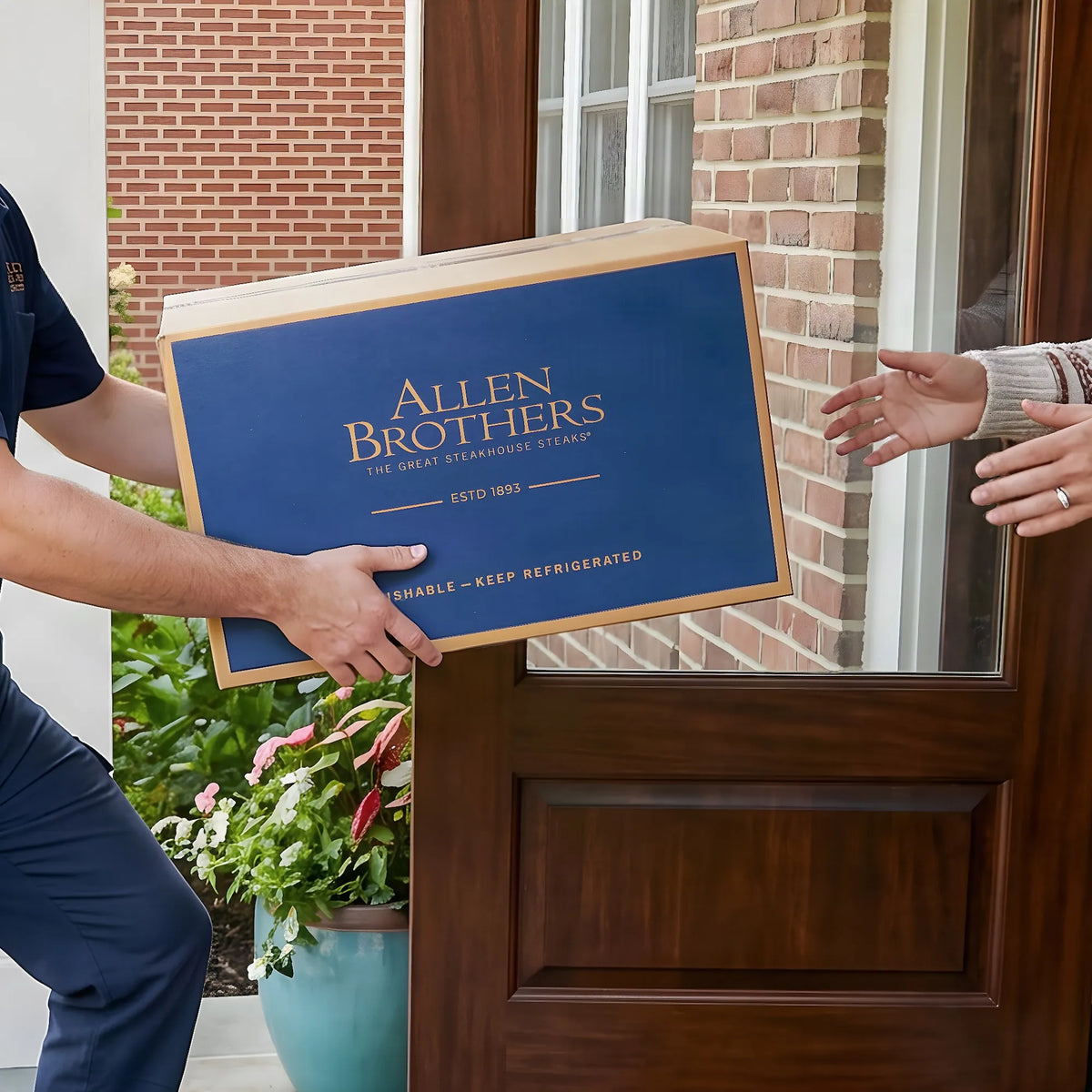 Allen Brothers gift box being delivered to a recipient.