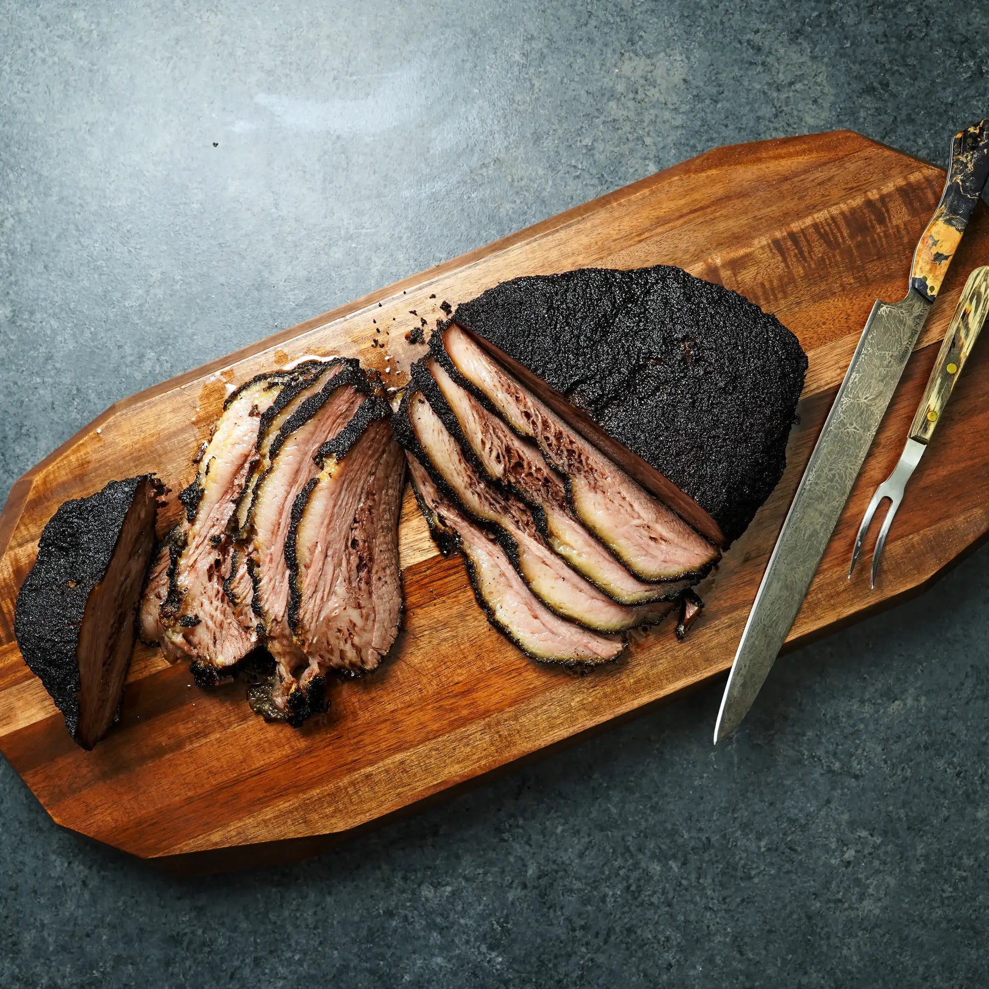 Cooked Brisket on Cutting Boa