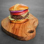 Burger on Wooden Cutting Board