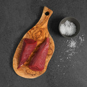 Choice Tenderloin Tails on cutting board