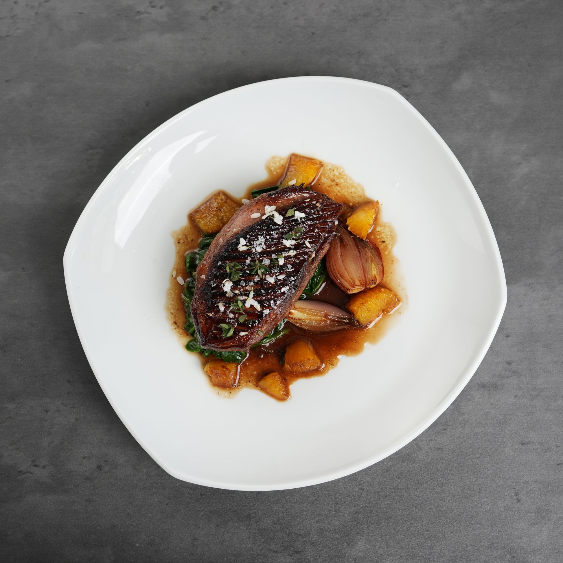 Allen Brothers Duck Breast Cooked on a white plate