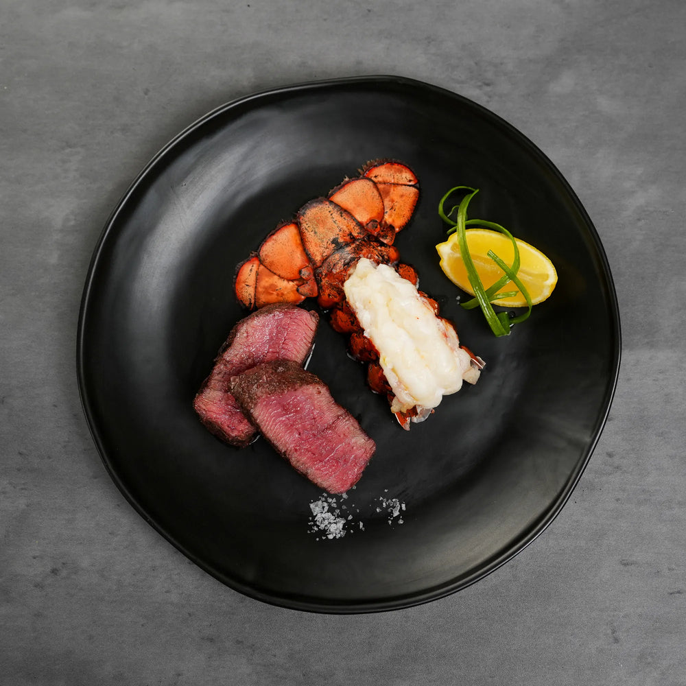 Steak and Lobster on Plate