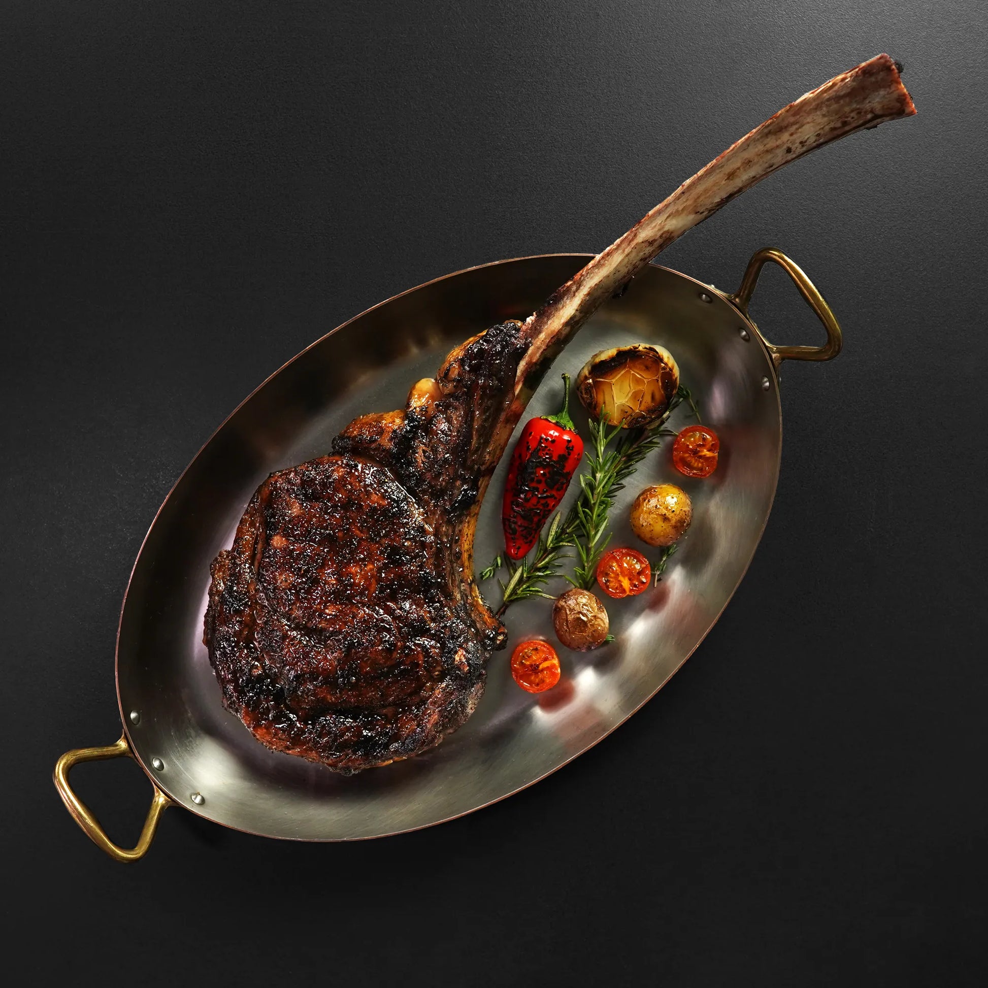 Cooked Tomahawk on Copper Tray