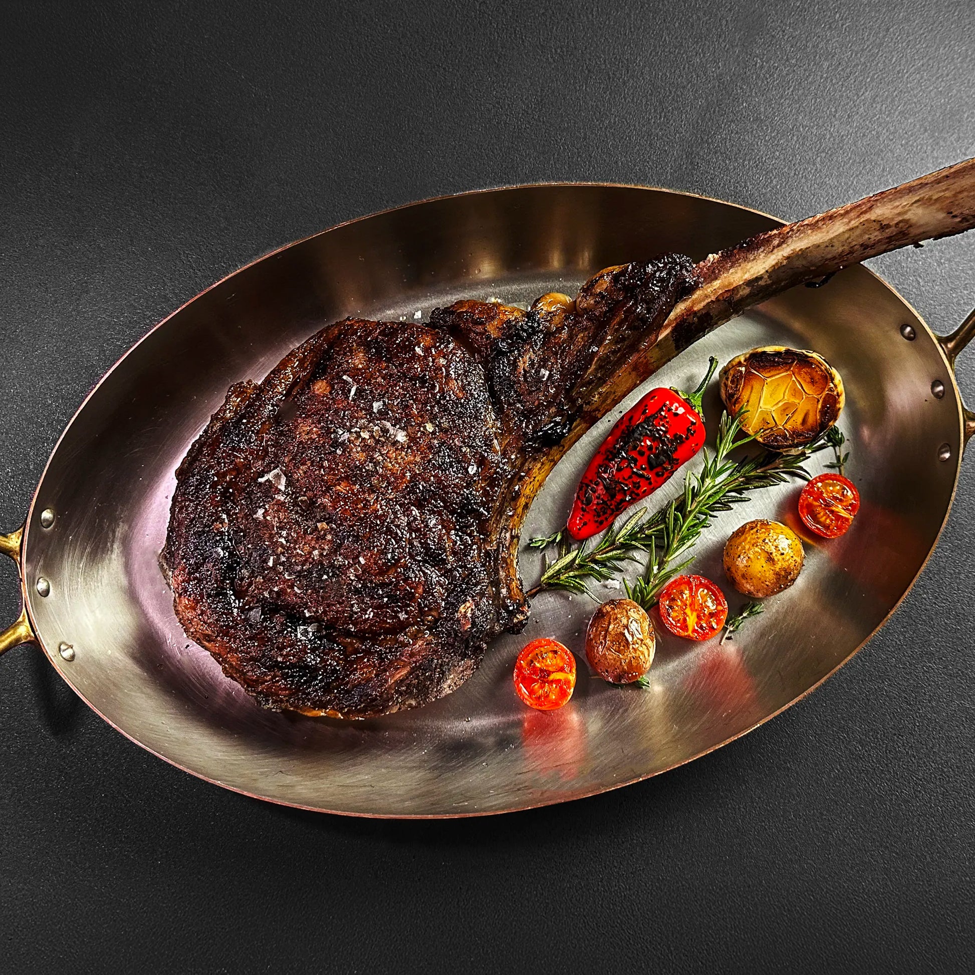 tomahawk in copper pan