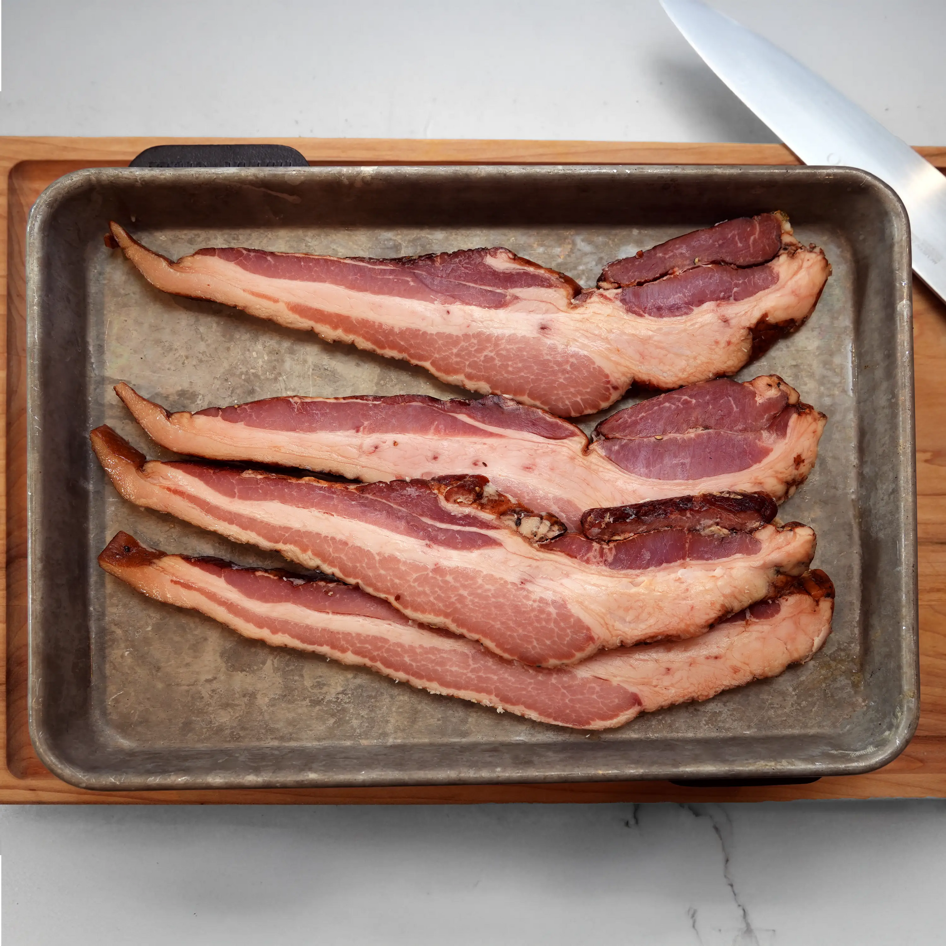 Raw Bacon on Tray