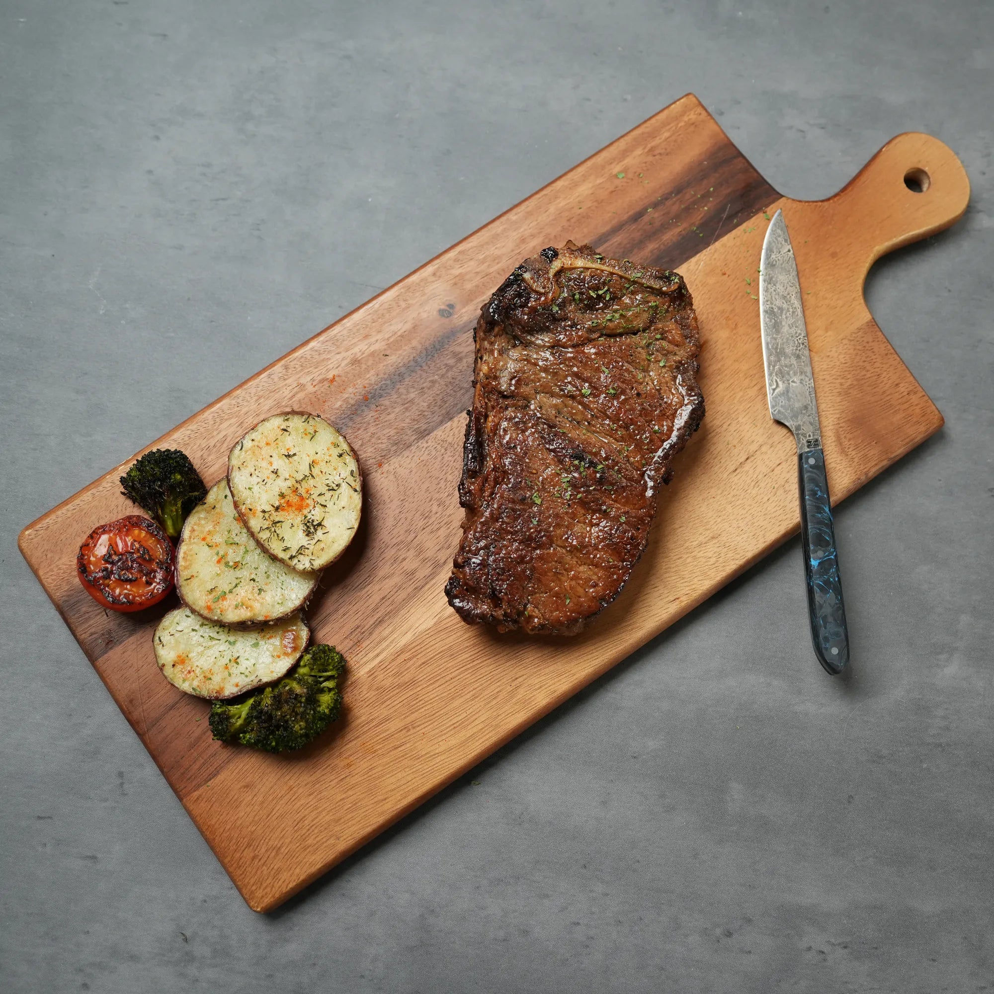 Cooked Bone-In Strip Steak 