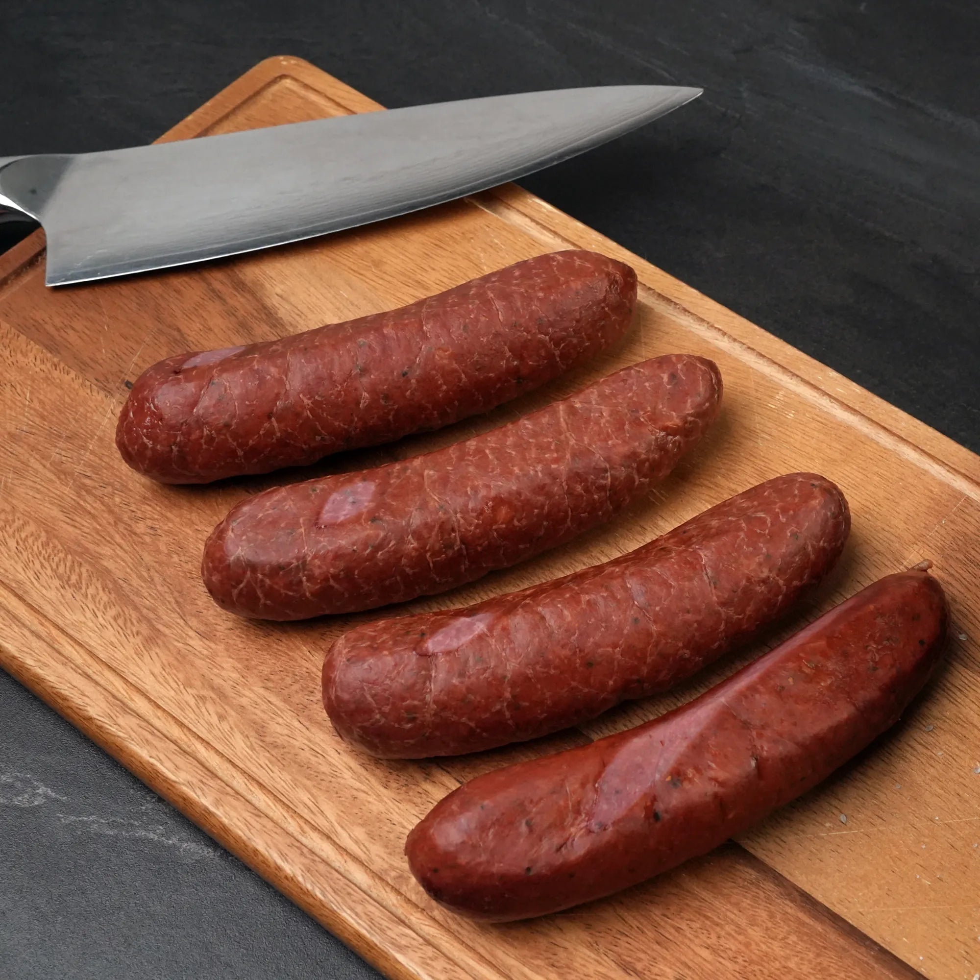 Rosewood Hickory Smoked Wagyu Sausage on Black