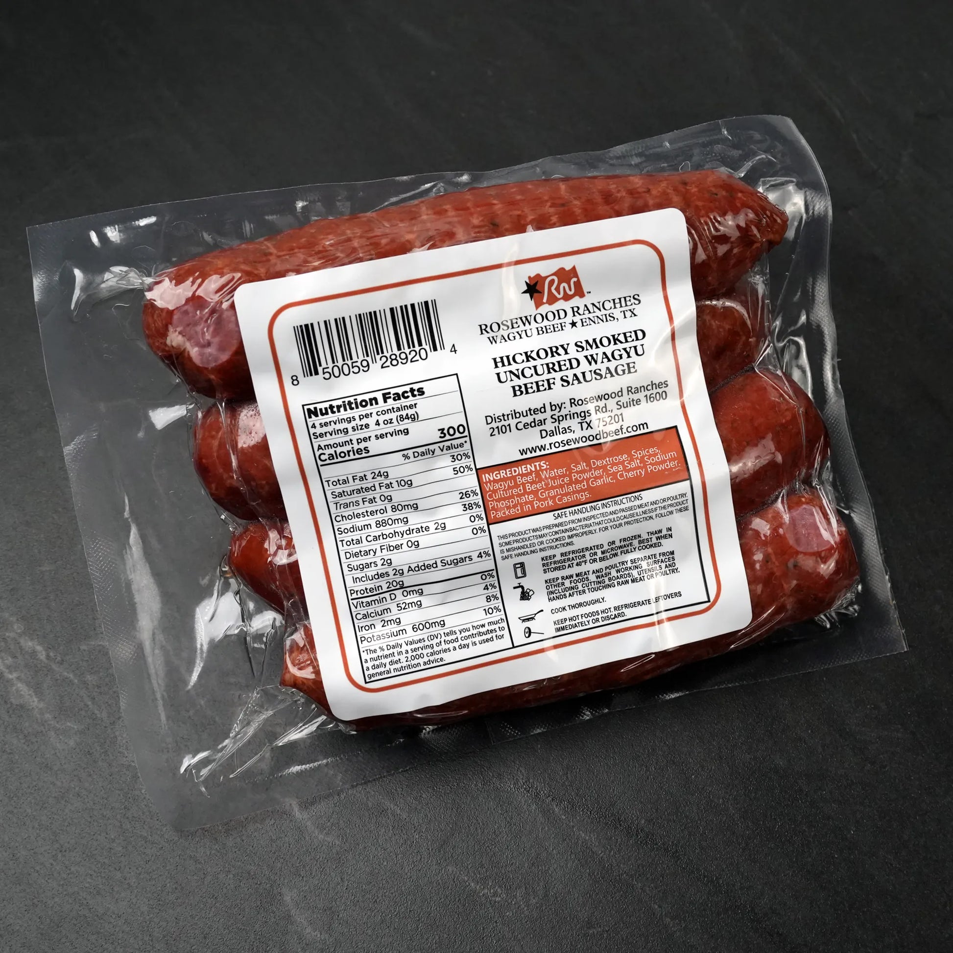 Rosewood Texas Wagyu Hickory Smoked Sausage pack of four, vacuum-sealed, showcasing premium Wagyu cuts, hickory-smoked flavor, and detailed nutrition and ingredient information.