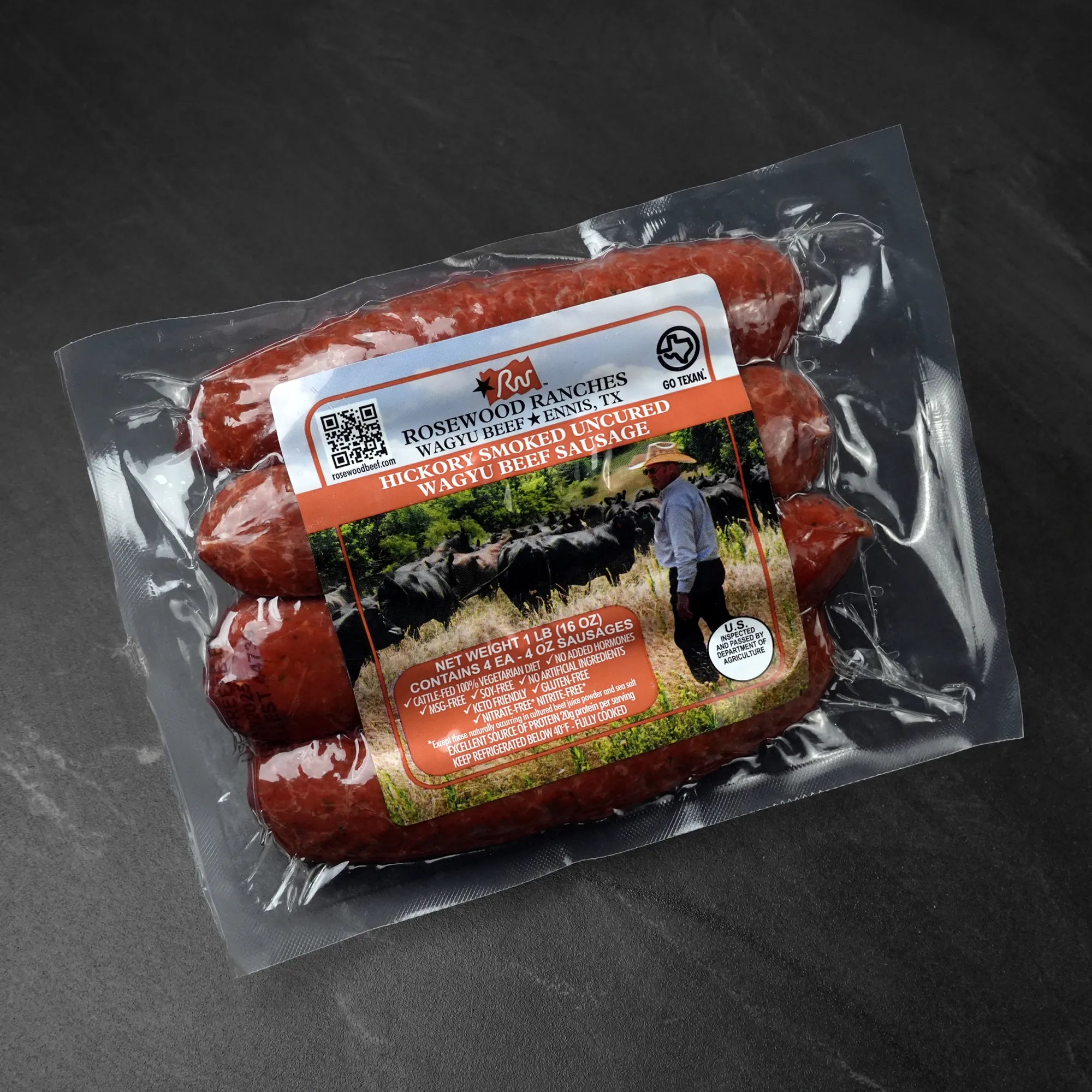 Package of Rosewood Texas Wagyu Hickory Smoked Sausage, featuring four links, USDA-inspected, gluten-free, nitrate-free, made from premium Wagyu, slow-smoked for rich flavor.