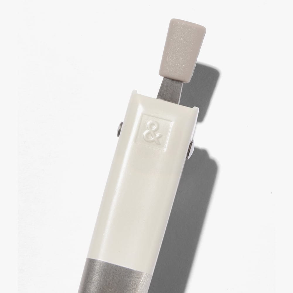 White tong handle with & logo and gray silicone cover
