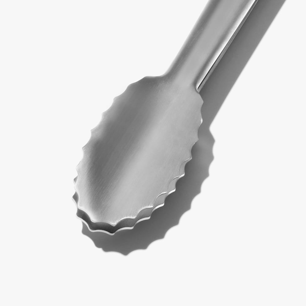 Stainless steel tongs with serrated scalloped tips and shiso green handle