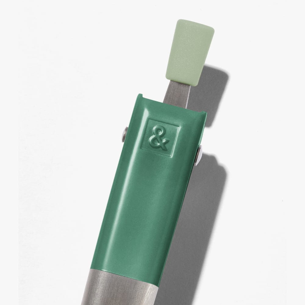 Shiso green handled stainless steel tongs with embossed '&' detail