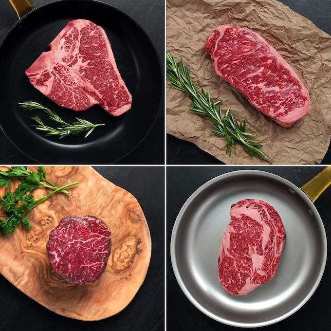 Steak Lovers Prime Combo: four cuts—filets mignon, porterhouse, strip steaks, ribeyes—displayed on pans and boards, garnished with rosemary and parsley.